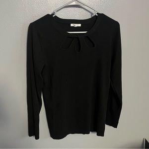 Maurice’s medium women’s top black with cutouts at neck